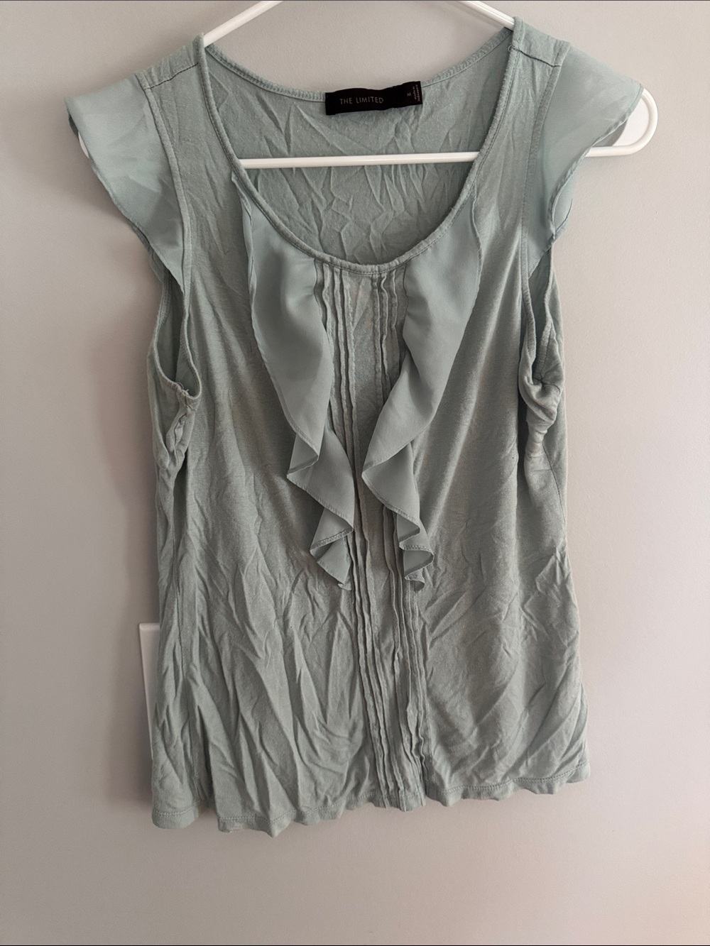 The Limited Light Mint Green Ruffle Front Sleeveless Top